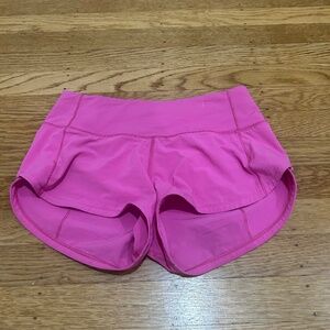 Sonic pink Lululemon low rise 2.5 inch speed ups, size 0